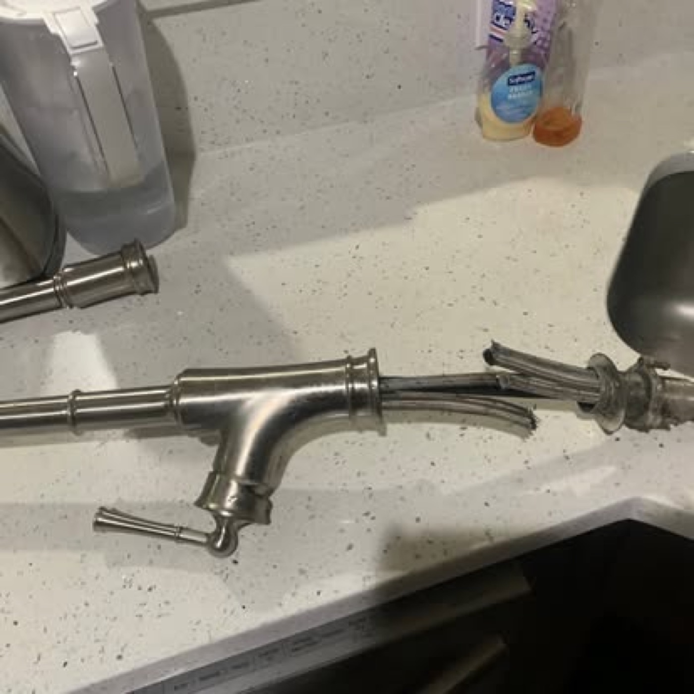 Old broken kitchen faucet removed