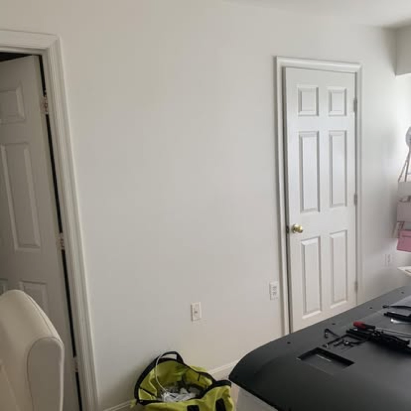 Empty wall before the TV was mounted